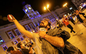 image-people-celebrate-as-the-state-of-emergency-decreed-by-the-spanish-government-to-prevent-the-spread-of-the-coronavirus-disease-covid-19-gets-lifted-in-madrid